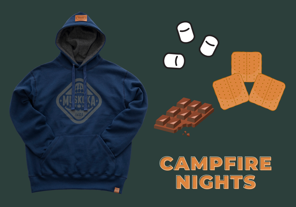 Graphic with text that reads Campfire nights. This is surrounded by graham crackers, chocolate, marshmallows and a navy Muskoka Bear Wear hoody