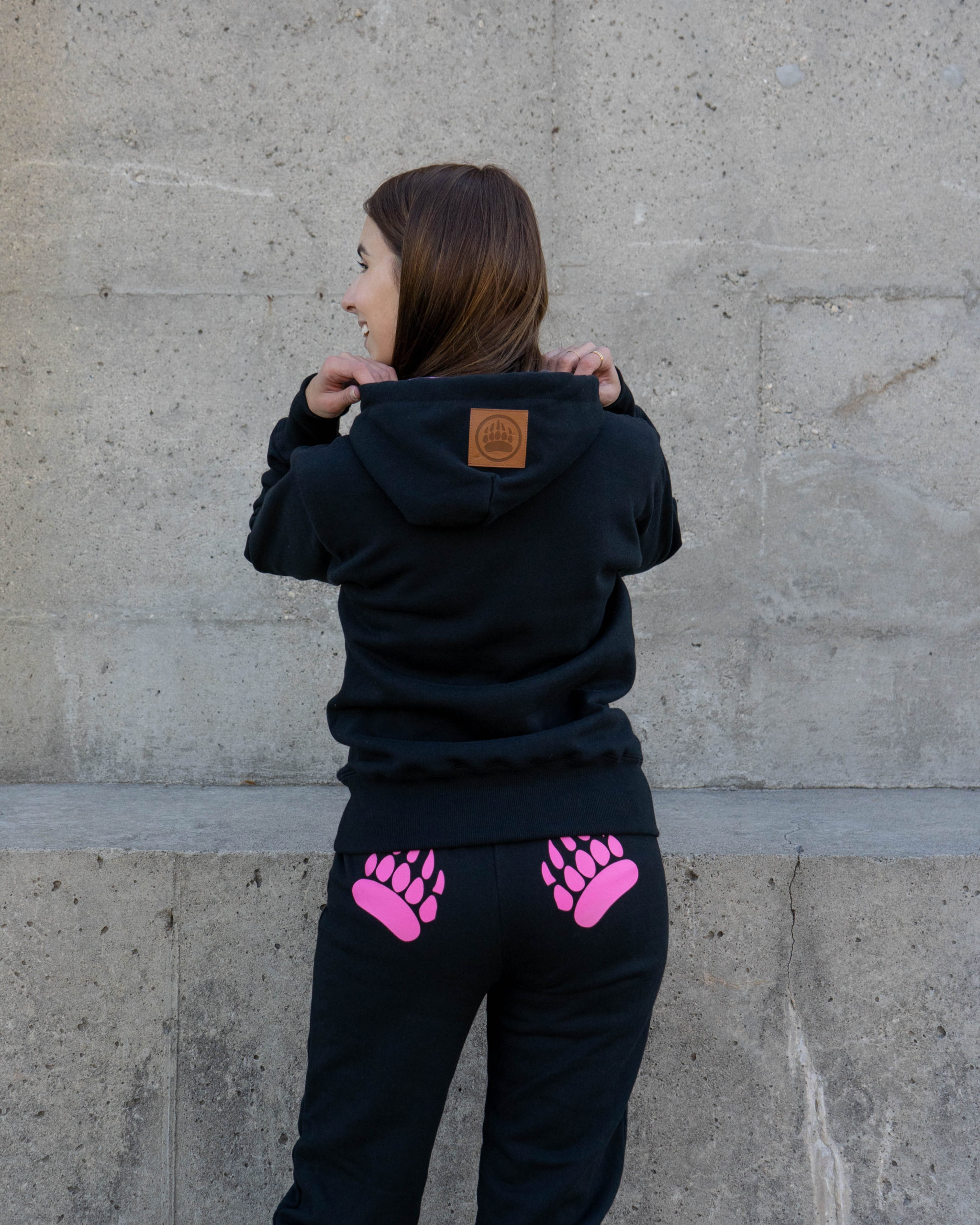Content Creator Em wearing the Black with Raspberry Ladies Cabin Hoody and Original Paw Pants