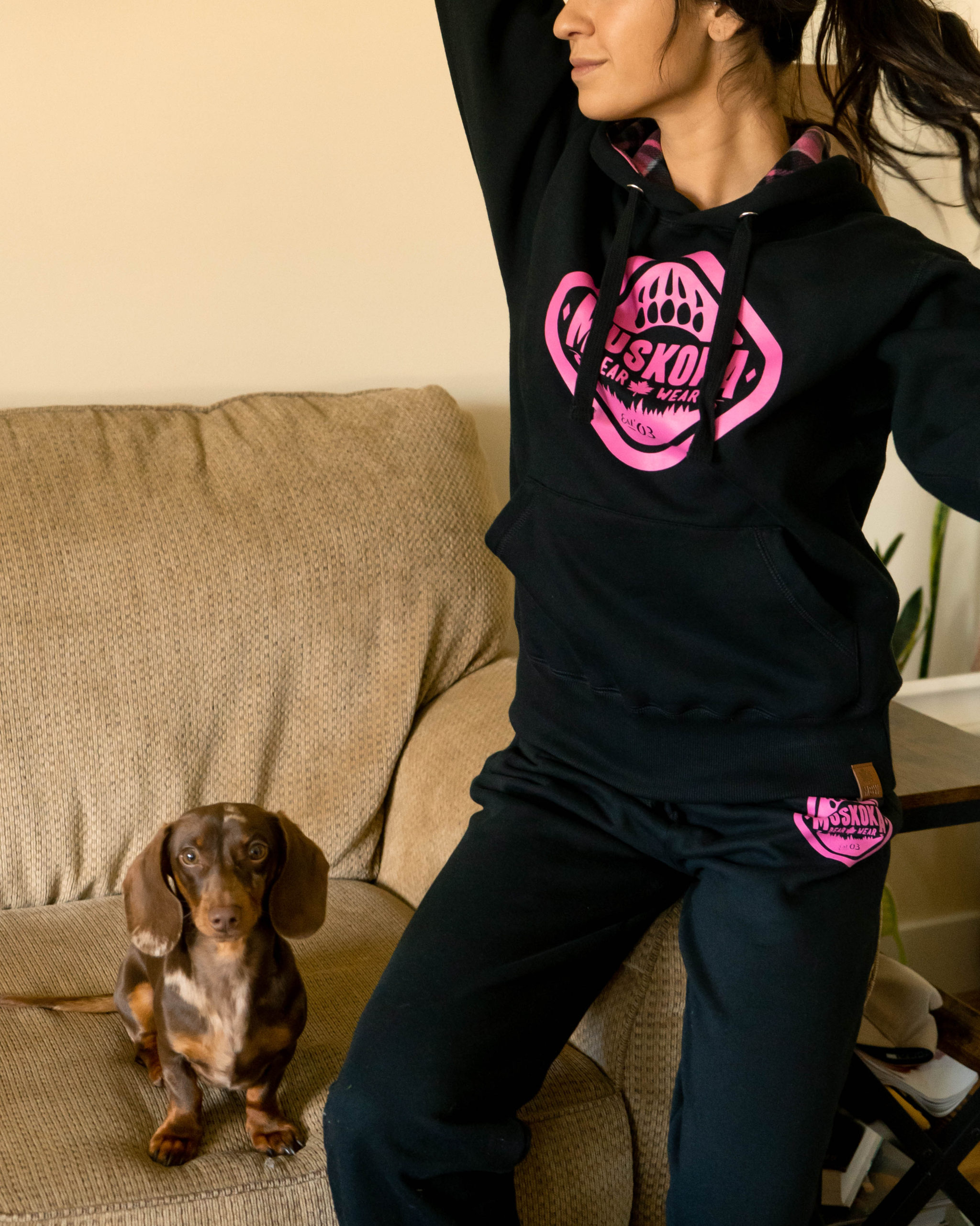 Content Creator Mal.Bee wearing the Black with Raspberry Ladies Cabin Hoody and Original Paw Pants