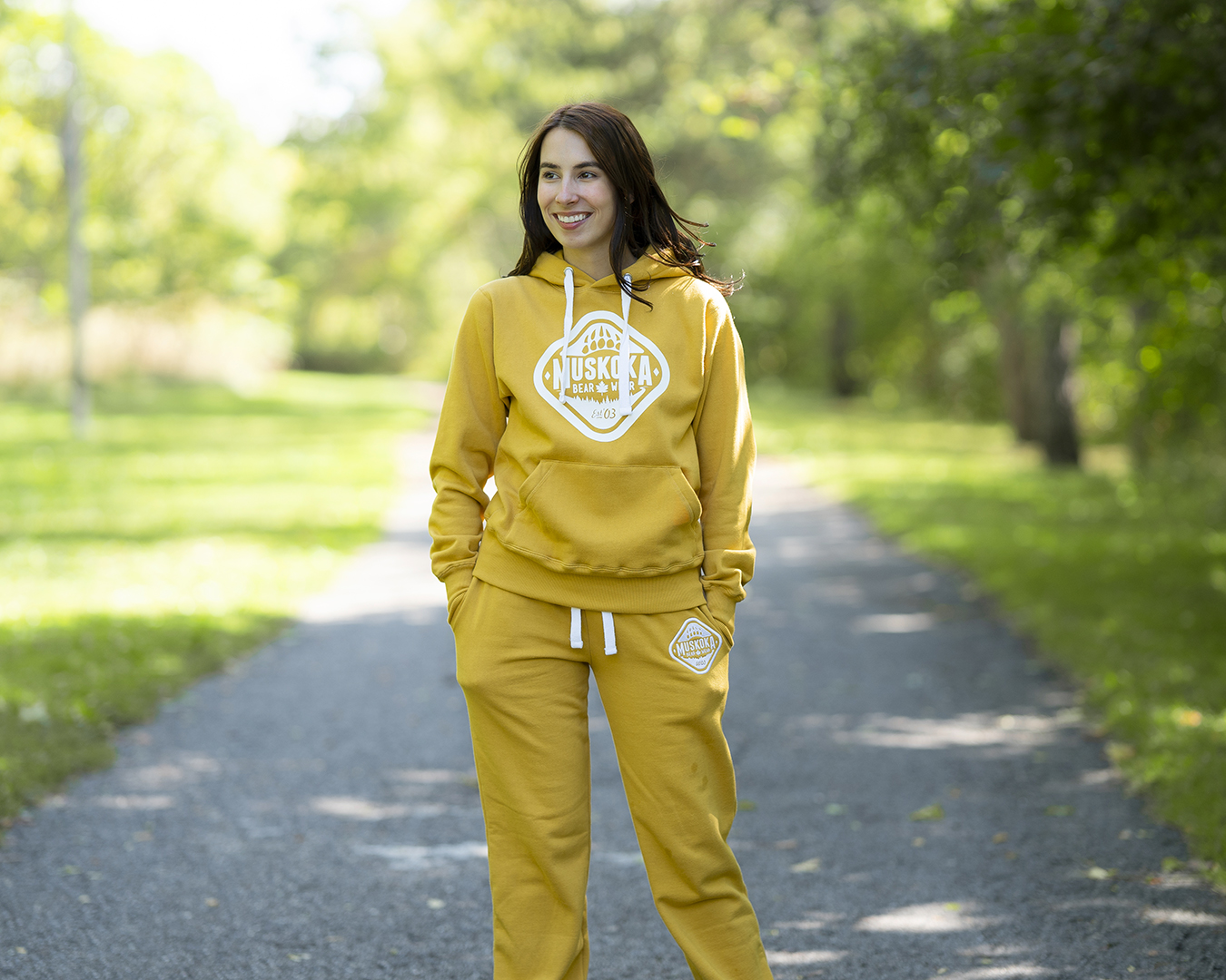 Canadian Influencer Em Rowsell wearing a Muskoka Bear Wear Harvest Golden Hoody with Matching sweatpants